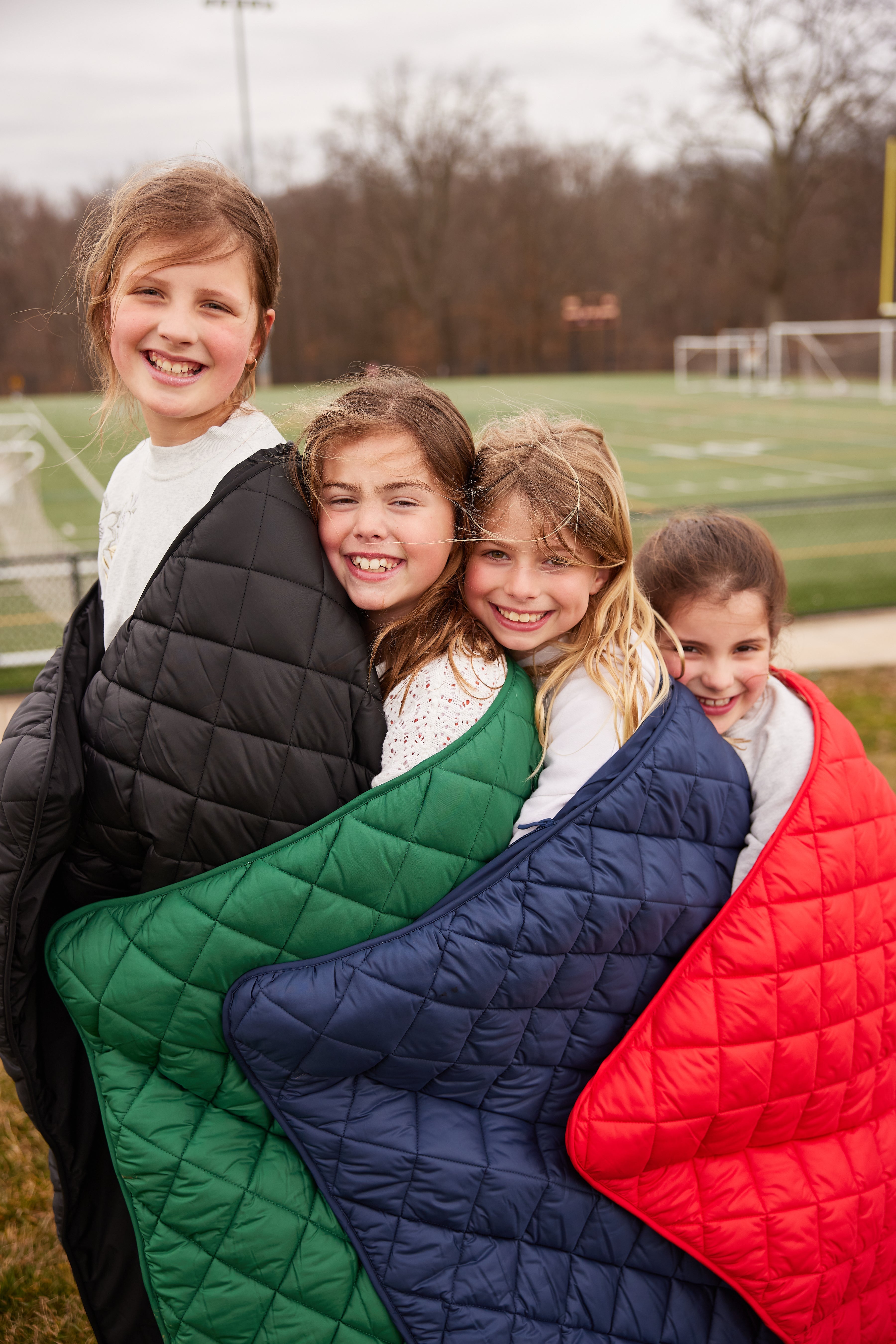Waterproof Puffer Blanket with Pockets | Pretty Rugged